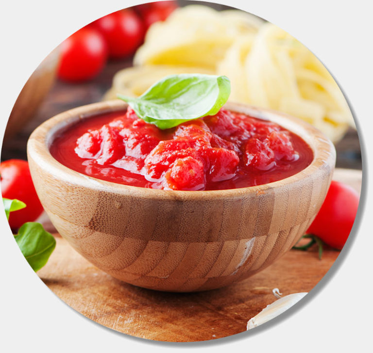 Italian traditional sauce with tomato and basil, selective focus